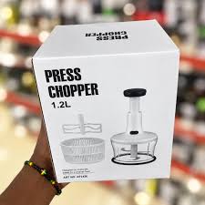The product featured on the packaging is the Multi-Function Manual Press Chopper